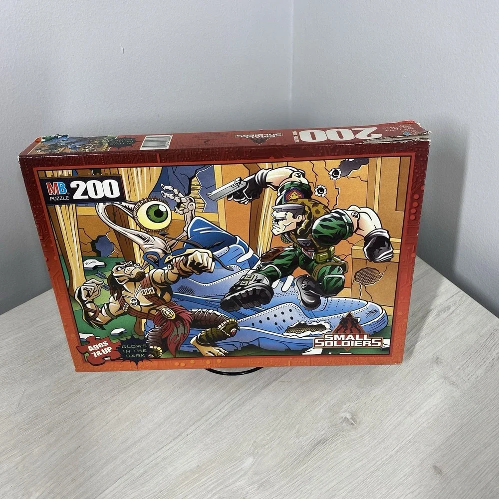Lot of Two Vintage 1998 Milton Bradley Small Soldiers Glow Dark 200pc Puzzles